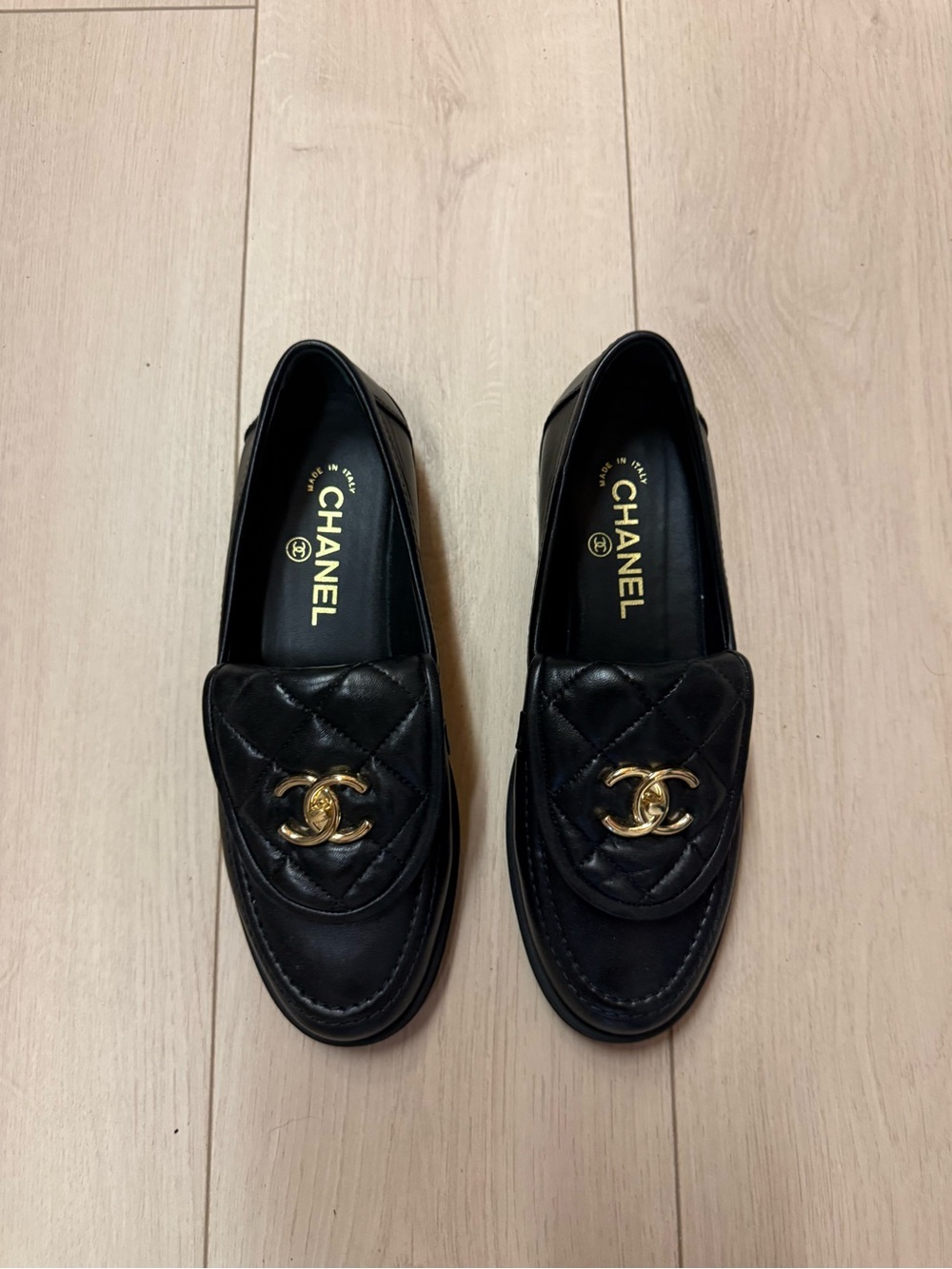 CHANEL Black Quilted Leather CC Logo Loafers with Gold Hardware